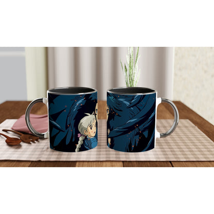 This mug features a Studio Ghibli-inspired design depicting Howl and Sophie from "Howl's Moving Castle" against a dark blue background.