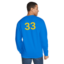 Person wearing a blue sweatshirt with the number 33 on the back against a white background