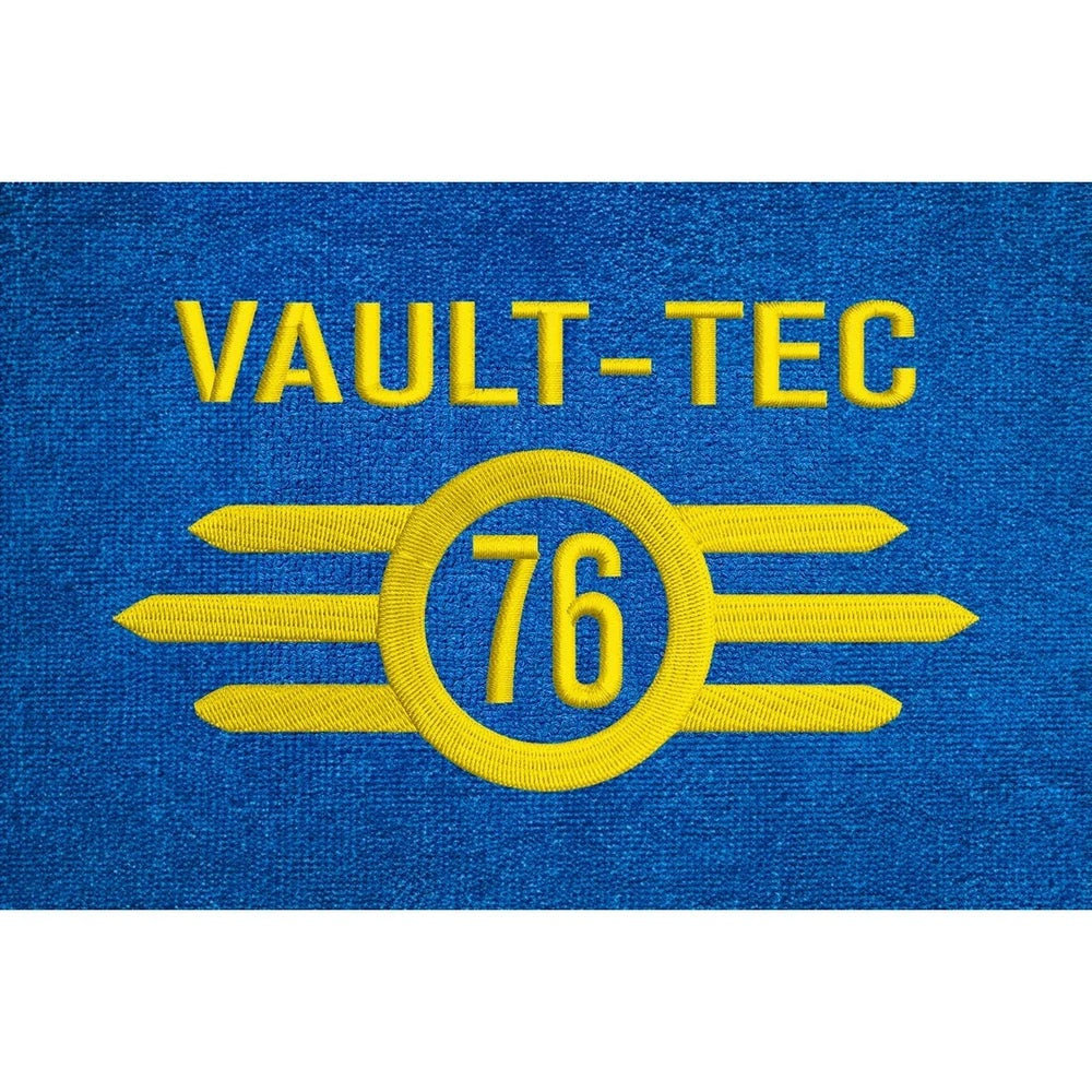 The blue bathrobe displays an embroidered Vault-Tec logo with the number 76, referencing the Fallout video game series.
