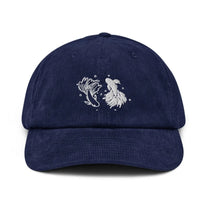 This navy corduroy Jujutsu Kaisen hat features embroidered betta fish designs on the front.