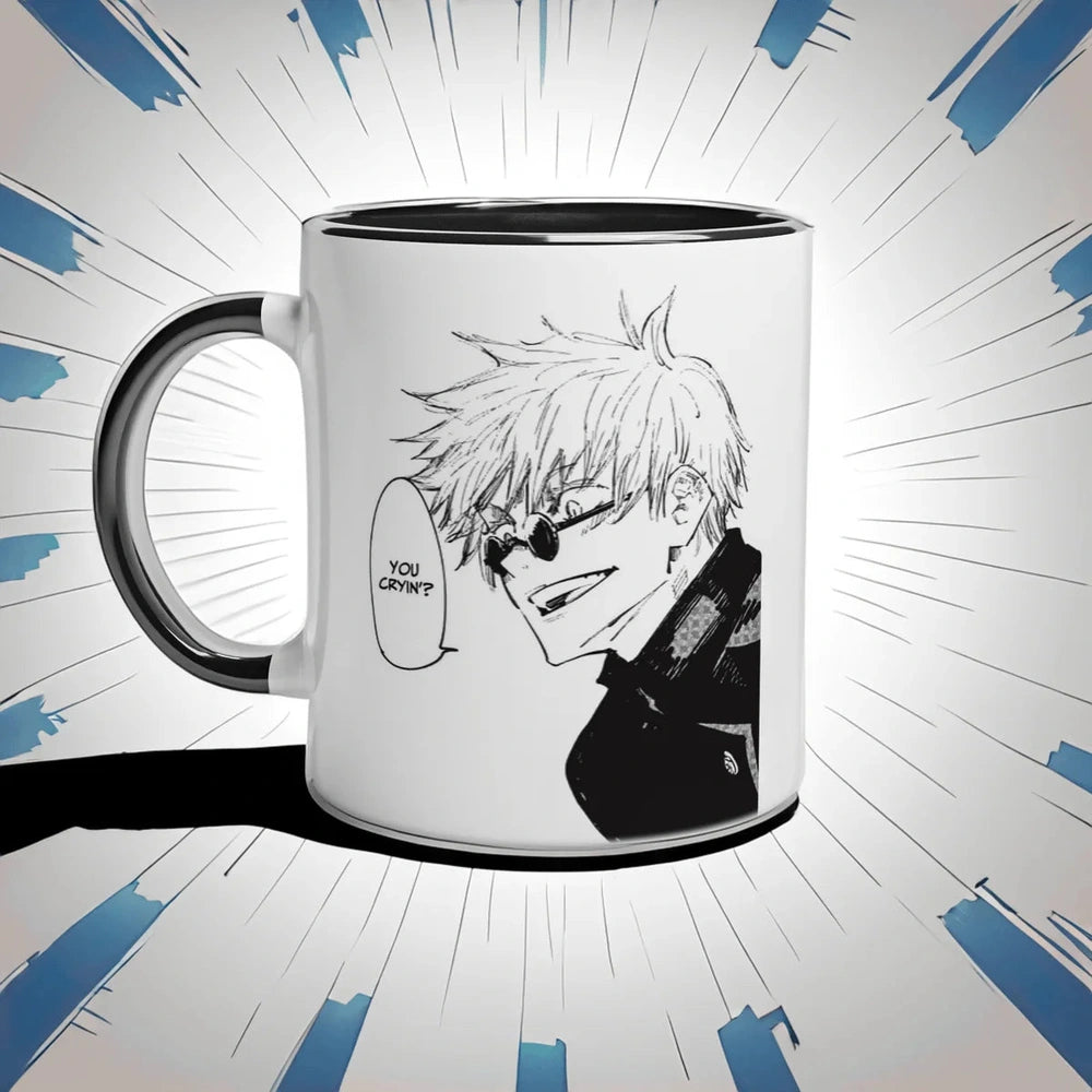 A black and white ceramic mug depicts a manga panel of Satoru Gojo from Jujutsu Kaisen with the text "You Cryin'?