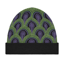 A knitted winter beanie hat featuring a green, purple, and black pattern inspired by the Room 237 wallpaper from The Shining.