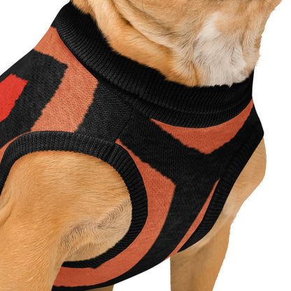 Close up details of dog wearing a Overlook Hotel carpet geometric patterned knit jumper on a white background