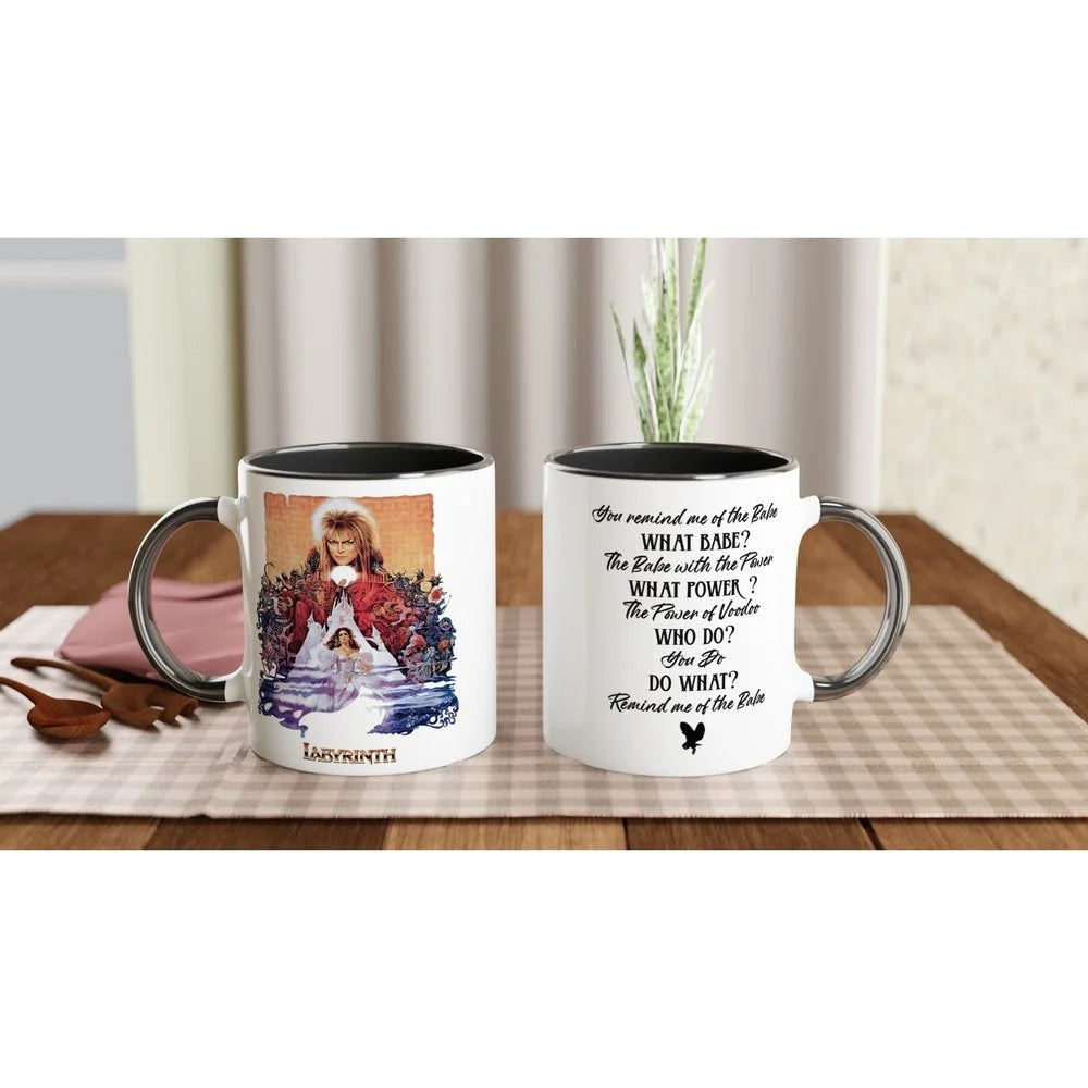 A white mug featuring imagery from the 1986 Labyrinth movie and phrases related to the fantasy film.
