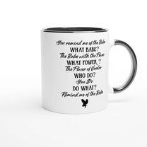 A white mug with a black handle and rim features stylized text referencing the 1986 Labyrinth movie.