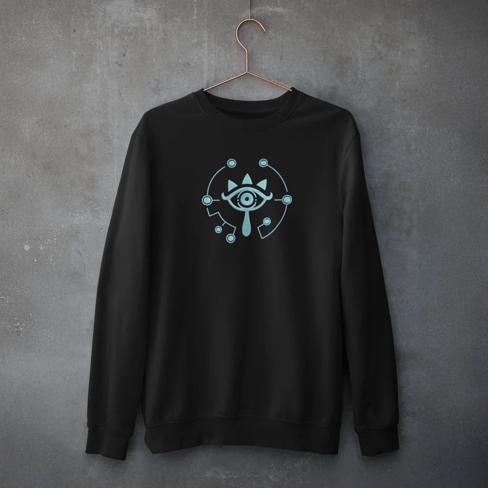 A black Zelda Sheikah Eye embroidery hoodie features a glow-in-the-dark design of an eye symbol on the front.
