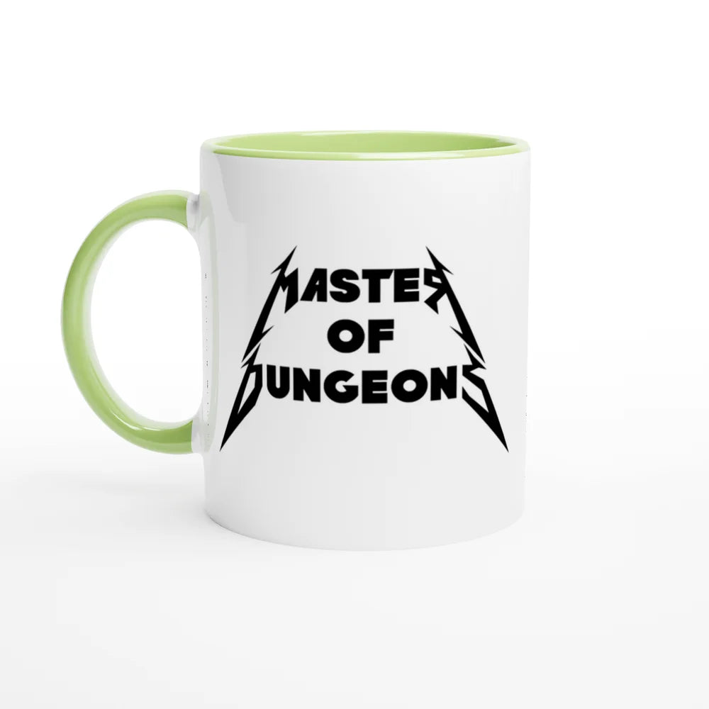 A white mug with a green handle and rim features "Master of Dungeons" printed in a font inspired by Metallica.