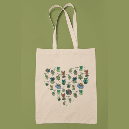 Legend of Zelda tote bag with korok pattern illustrations on a green background
