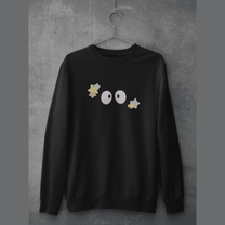 A black Soot Sprites embroidered sweater displays three stylized characters from Studio Ghibli's Spirited Away on the chest.