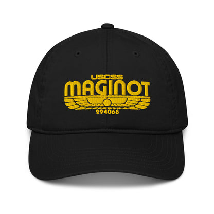 A black baseball cap features an embroidered logo displaying "USCSS MAGINOT" and a winged design along with the number 294068.