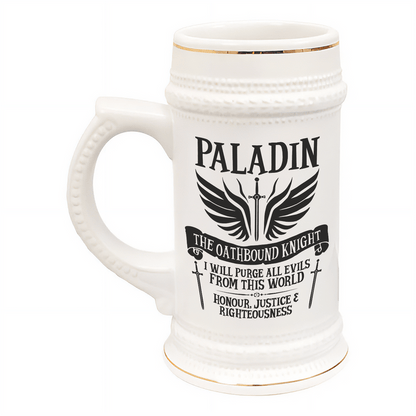 A white ceramic tankard features gold accents and displays "Paladin" along with imagery referencing a D&D character class.