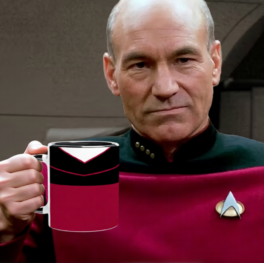 Picard with a uniform inspired Star Trek Next Generation mug in his hand
