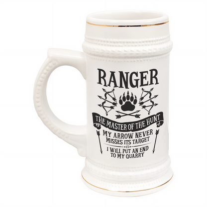 A white ceramic tankard, referencing a D&D Ranger character class, features gold accents and graphics of arrows and a paw print.