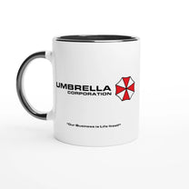 A white mug features the Umbrella Corporation logo from Resident Evil along with the phrase "Our Business is Life Itself".