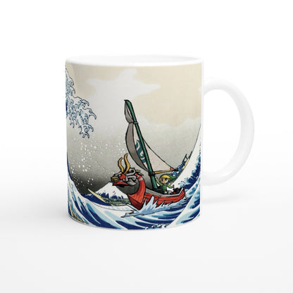 A white mug depicts Link from Legend of Zelda Wind Waker sailing a boat inspired by The Great Wave off Kanagawa artwork.