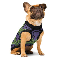 Dog wearing an Overlook Hotel Room 237 Wallpaper pattern knitted jumper on a white background