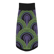 A pet sweater featuring a green, purple, and black Room 237 wallpaper pattern inspired by horror films.