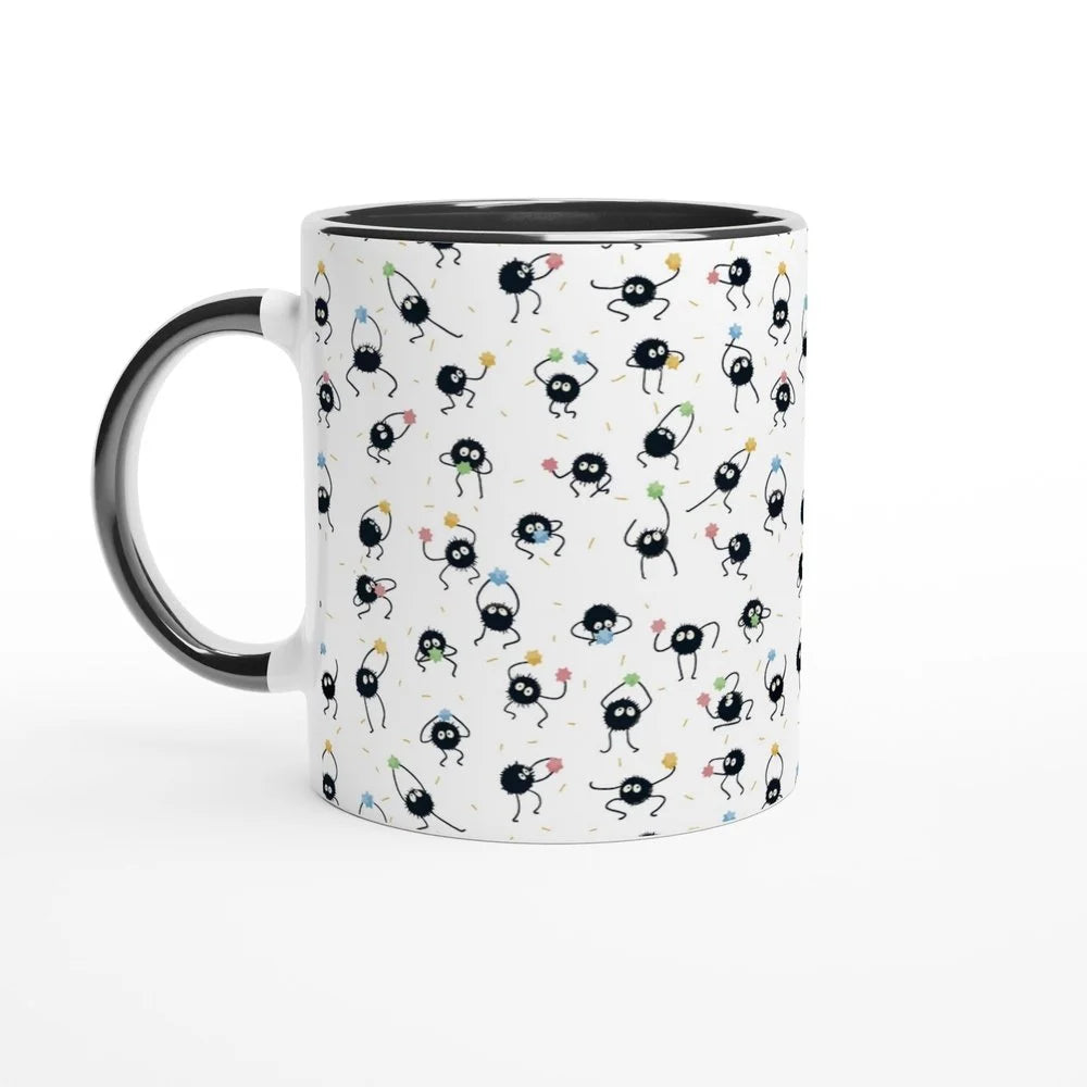 A white 11oz mug features a repeating pattern of Susuwatari, also known as dust sprites from Studio Ghibli's Spirited Away.