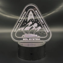 An LED engraved acrylic lamp depicts a Starfleet Yards logo for Utopia Planitia and the Sol System, featuring spacecraft silhouettes.