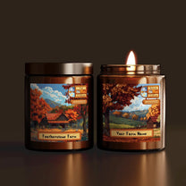 Two Stardew Valley scented candles display pixelated autumn landscapes featuring farmhouses and trees, one labeled "Featherstone Farm" and the other reading "Your Farm Name.