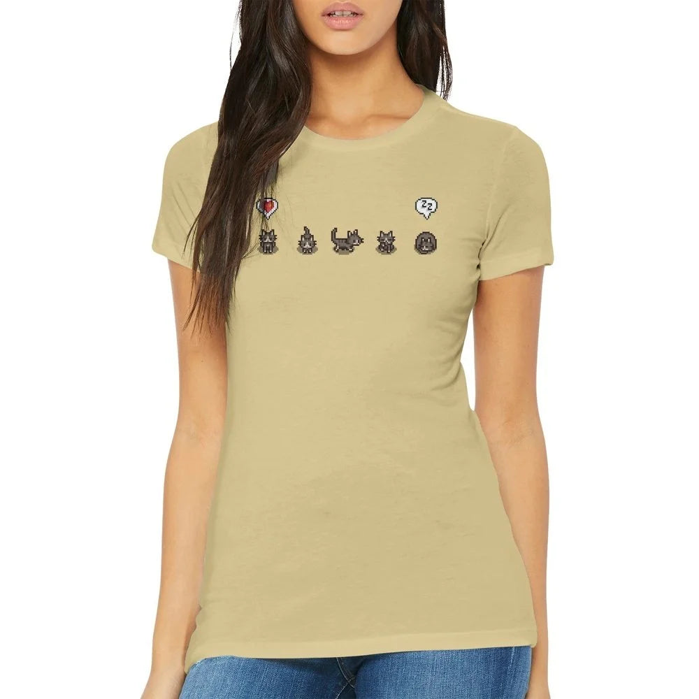 A woman wears a grey Stardew Valley T-Shirt featuring illustrations of cats and emotes from the game.