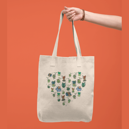 Legend of Zelda tote bag with korok illustrations on an orange background