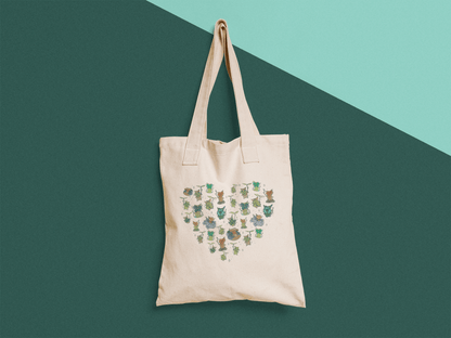 Legend of Zelda tote bag with korok pattern illustrations on a green and blue background