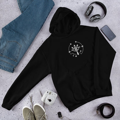 A black hoodie features an embroidered Sheikah Eye design inspired by The Legend of Zelda: Tears of the Kingdom and Breath of the Wild.