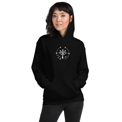 A person wearing a black Zelda Sheikah Eye embroidery hoodie featuring a glowing eye design inspired by The Legend of Zelda: Breath of the Wild (BOTW) and Tears of the Kingdom (TOTK).