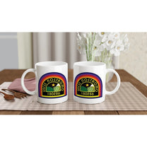 Two white ceramic mugs display a rainbow-colored USCSS Nostromo logo and number 180286.
