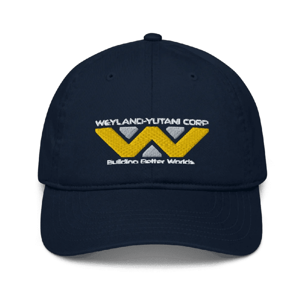 A navy blue baseball cap features an embroidered Weyland-Yutani Corp logo and the words "Building Better Worlds".