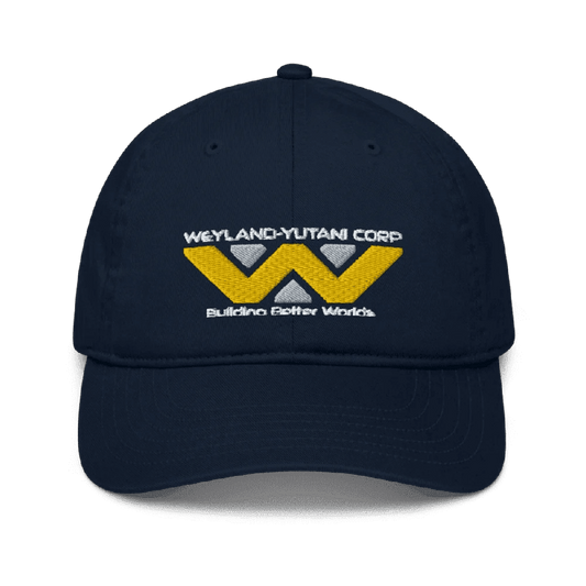 A navy blue baseball cap features an embroidered Weyland-Yutani Corp logo and the words "Building Better Worlds".
