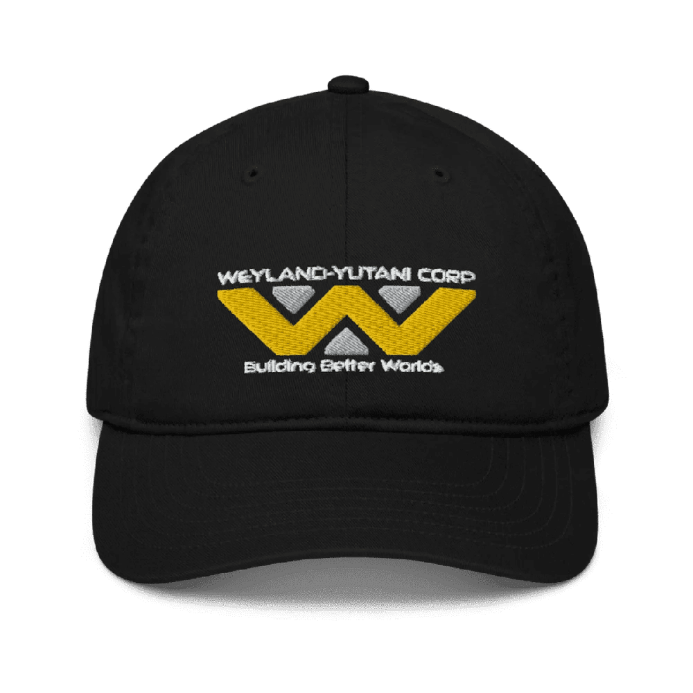 A black baseball cap features an embroidered Weyland-Yutani Corp logo with yellow lettering and a stylized "W" design above the words "Building Better Worlds.