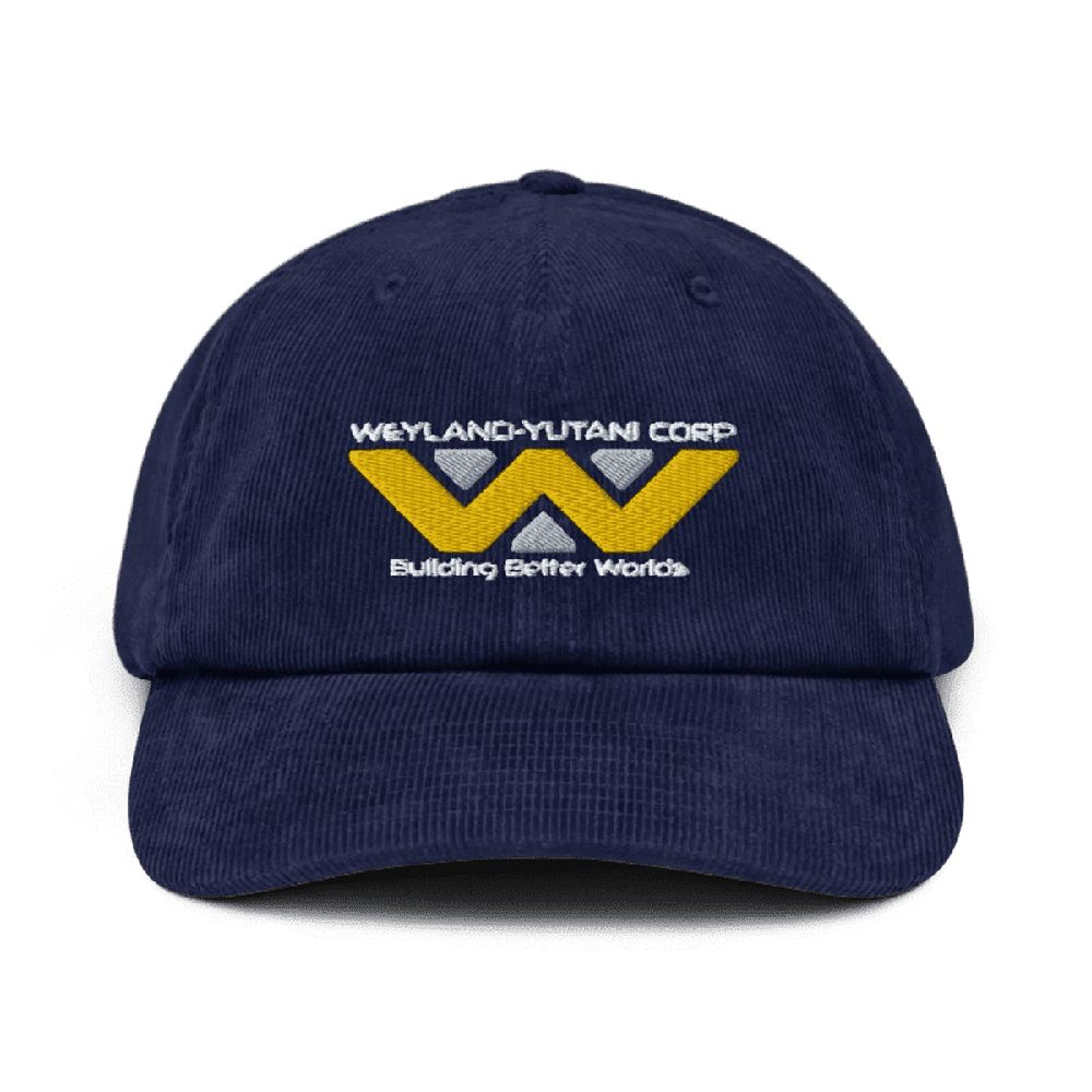A navy blue baseball cap features an embroidered Weyland-Yutani Corp logo and the phrase "Building Better Worlds.